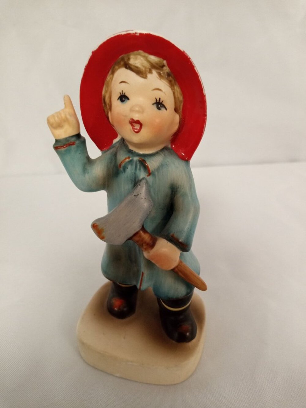Vintage Lefton Porcelain Figurine Little Boy Fireman Model #050 from 1957